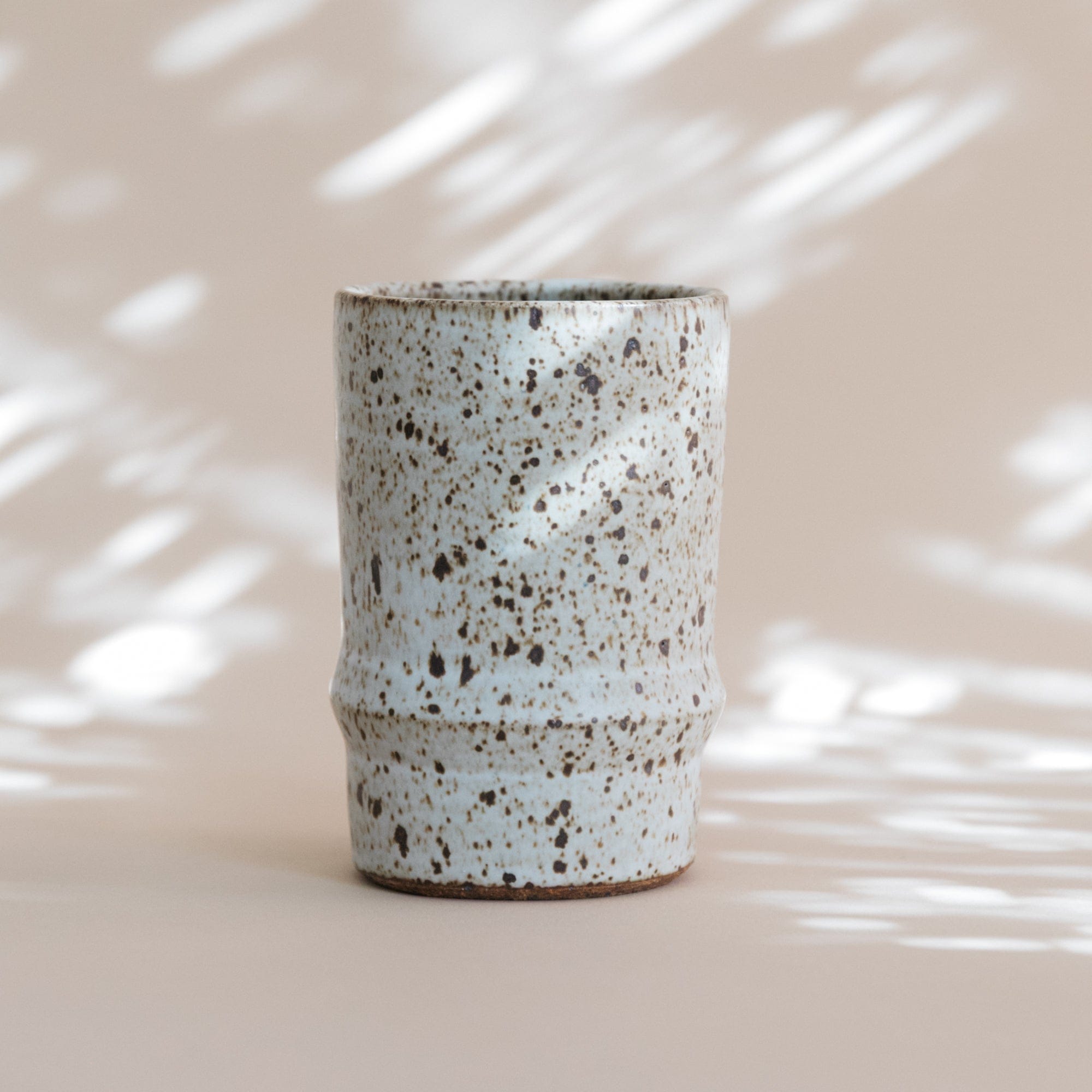 Olivia Snow Drinkware Low Angle Speckled Ceramic Tumbler