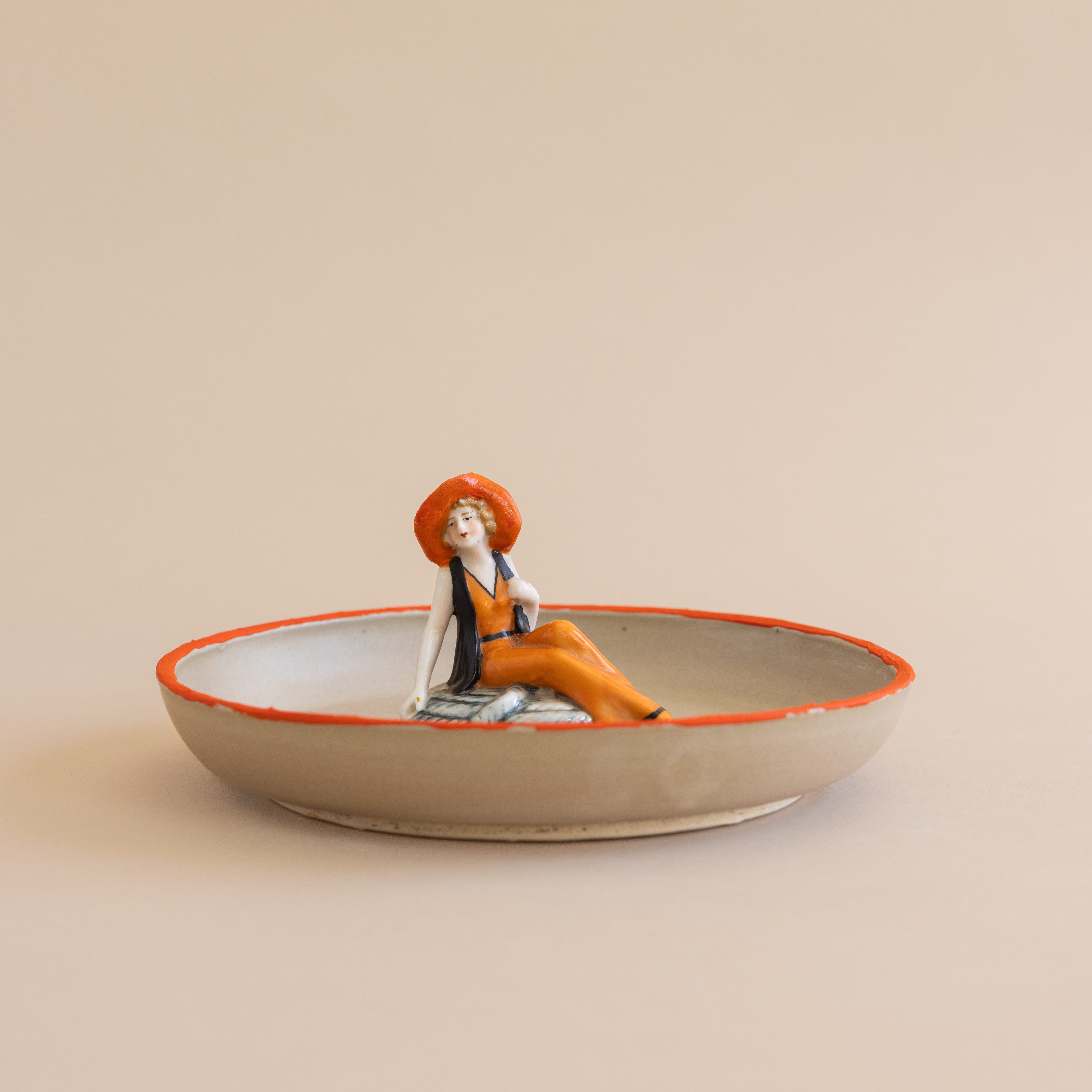 Abra Edelman Trays + Catchalls Grey Bowl with Woman in Orange Hat Figurine Dishes by Abra Edelman