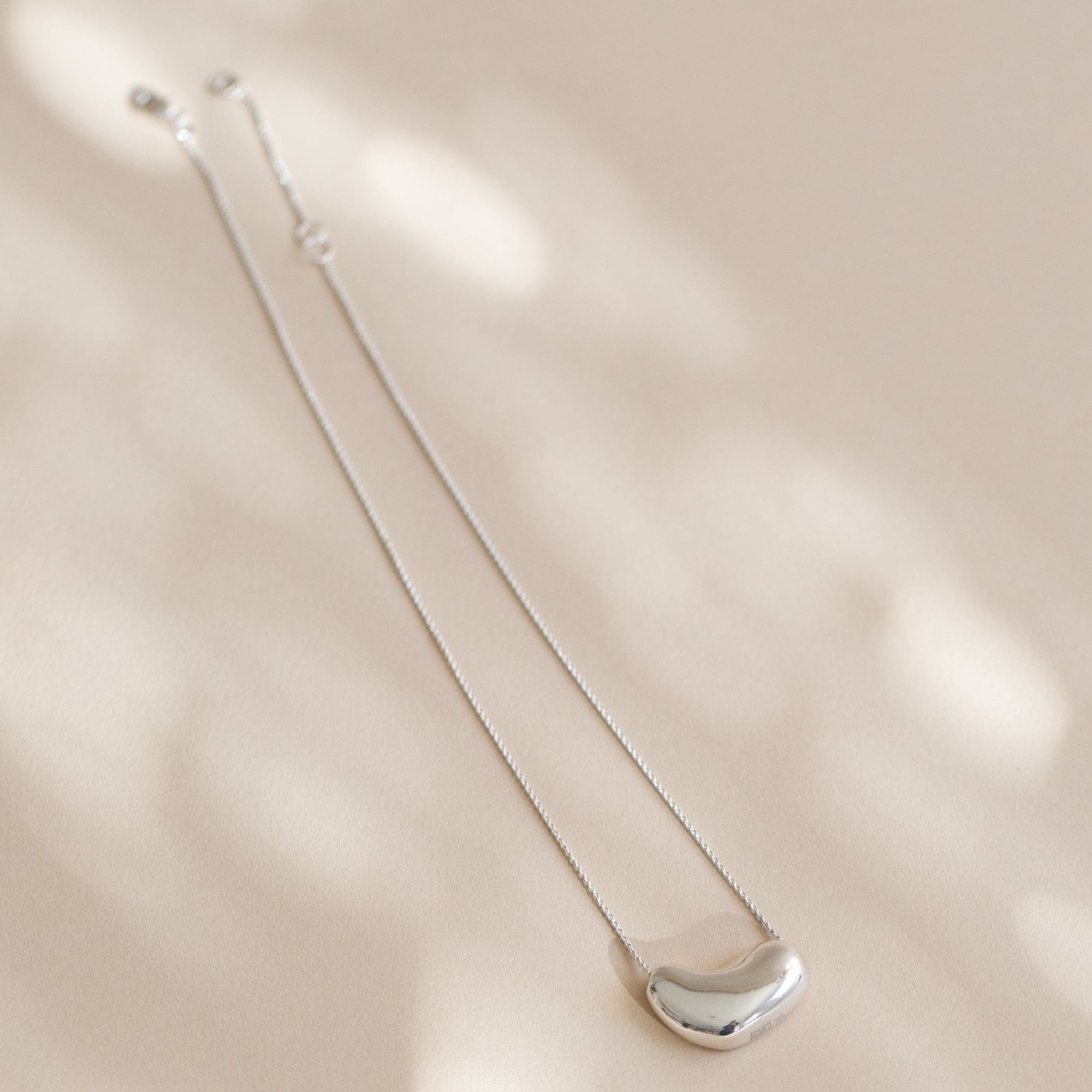 Small Sculpted Heart Pendant by Agmes