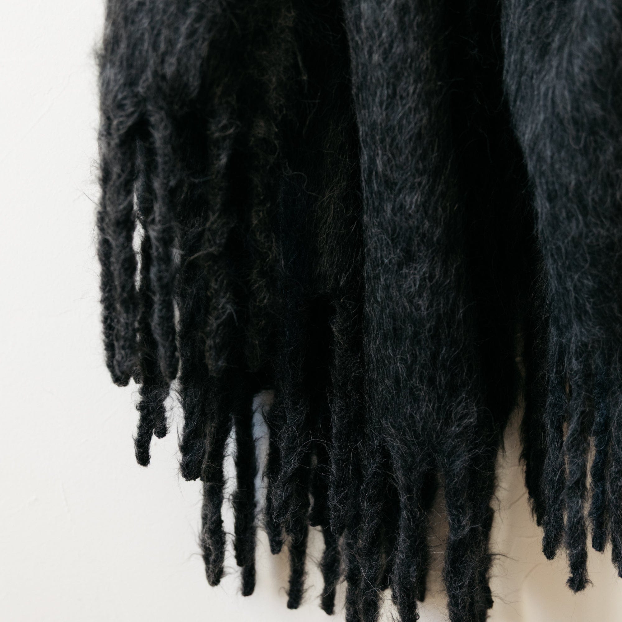 Dove and Donkey Blankets + Throws Charcoal Wooly Mammoth Throw