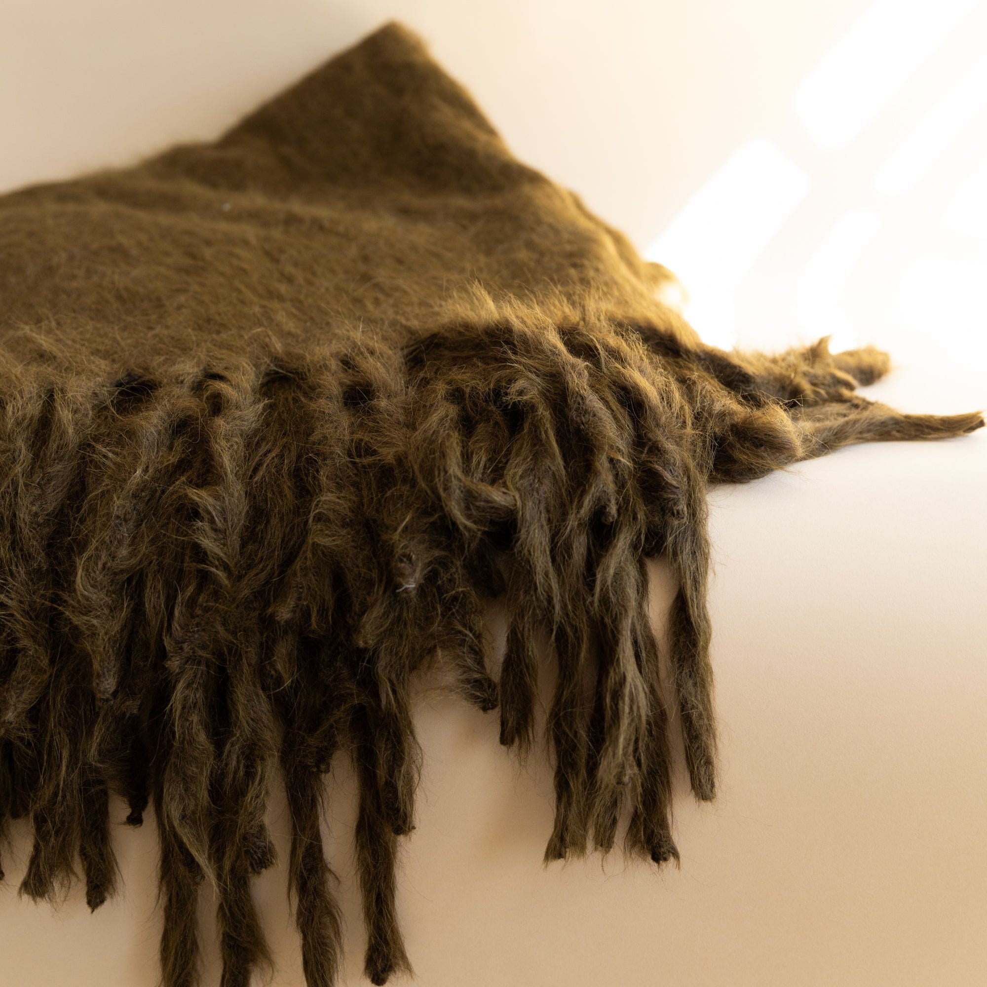 Dove and Donkey Blankets + Throws Tobacco Wooly Mammoth Throw