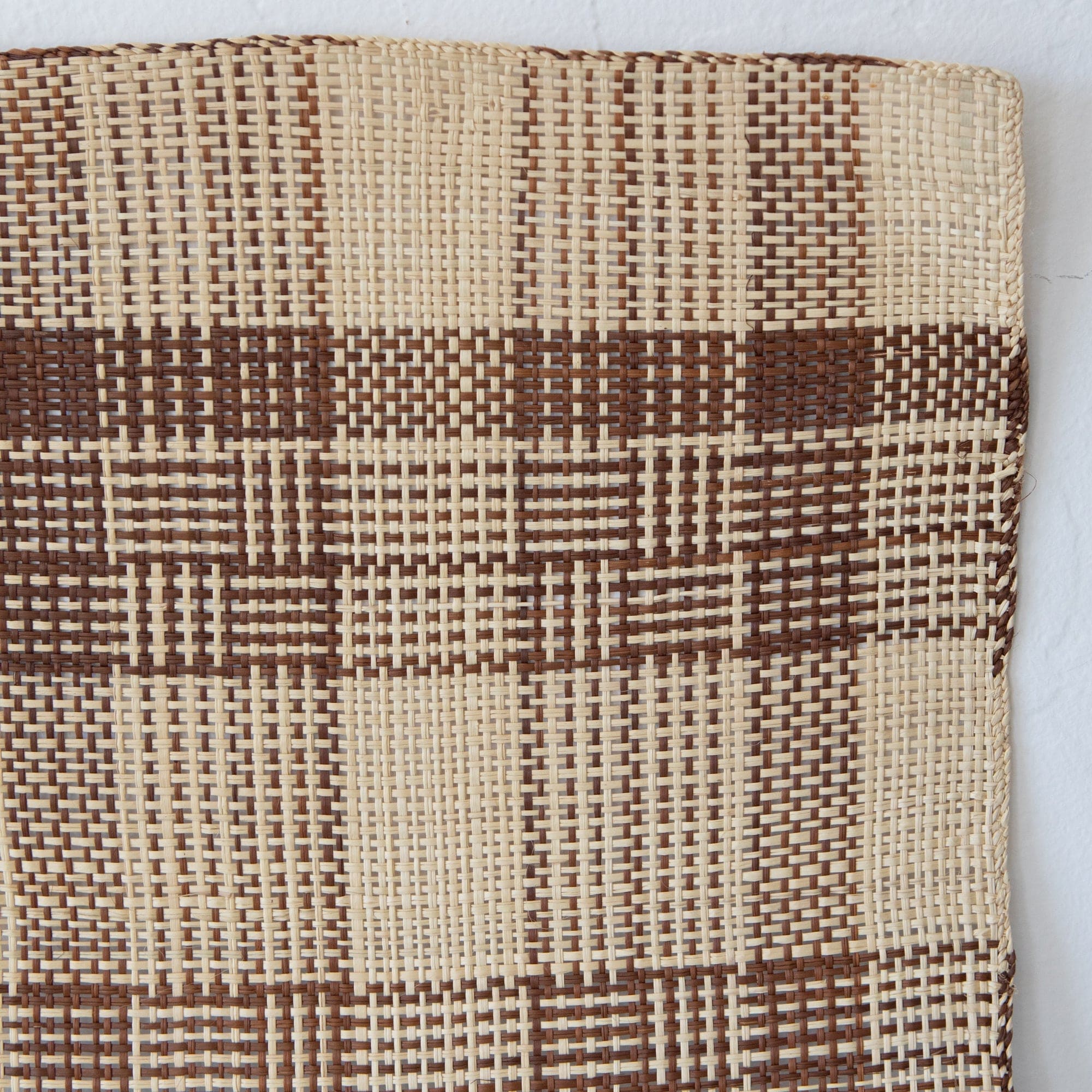 Guanabana Placemats Straw Placemat in Cognac Plaid