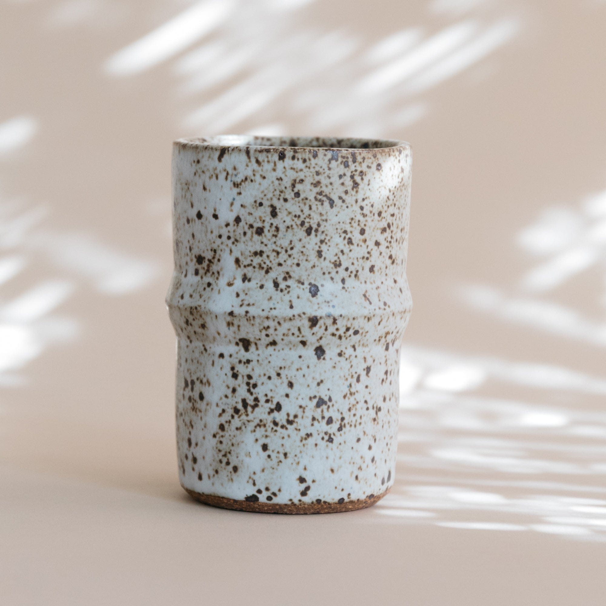 Olivia Snow Drinkware Mid Angle Speckled Ceramic Tumbler