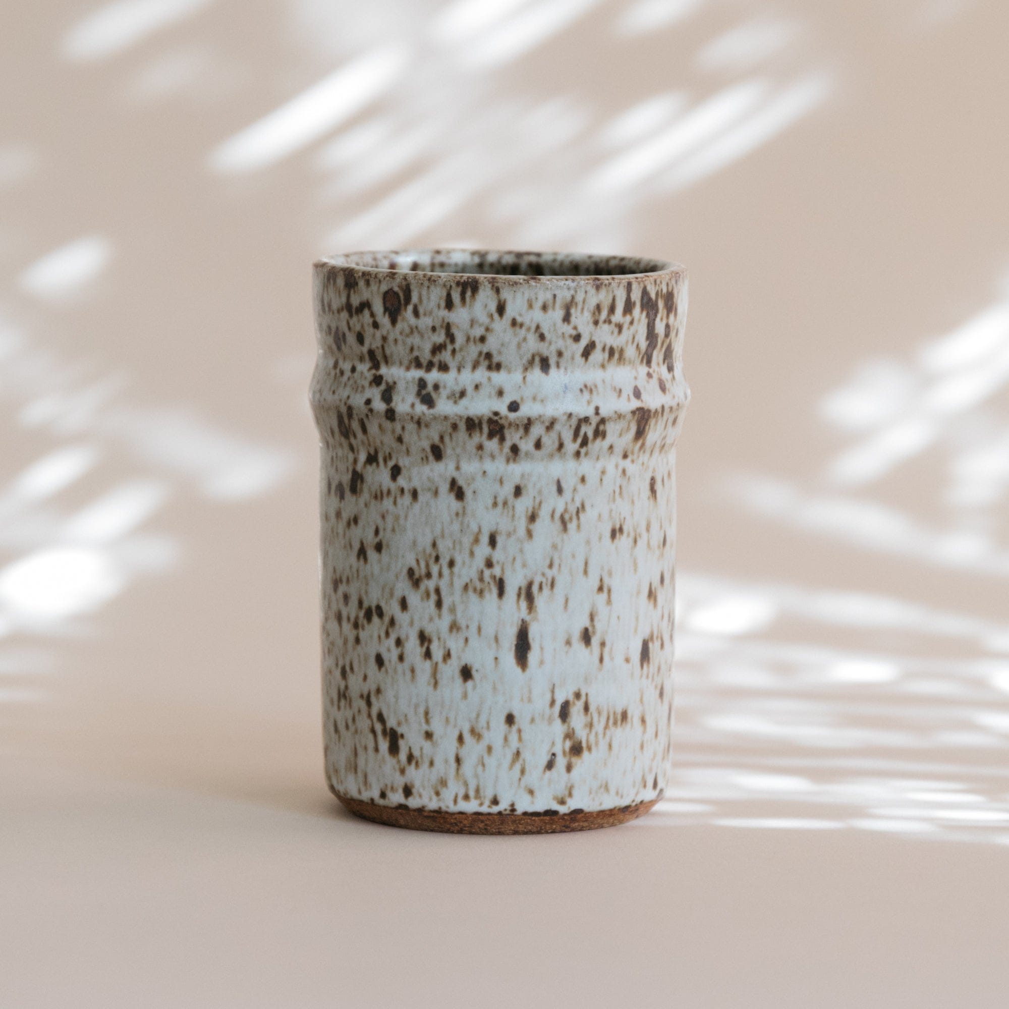 Olivia Snow Drinkware Top Angle Speckled Ceramic Tumbler