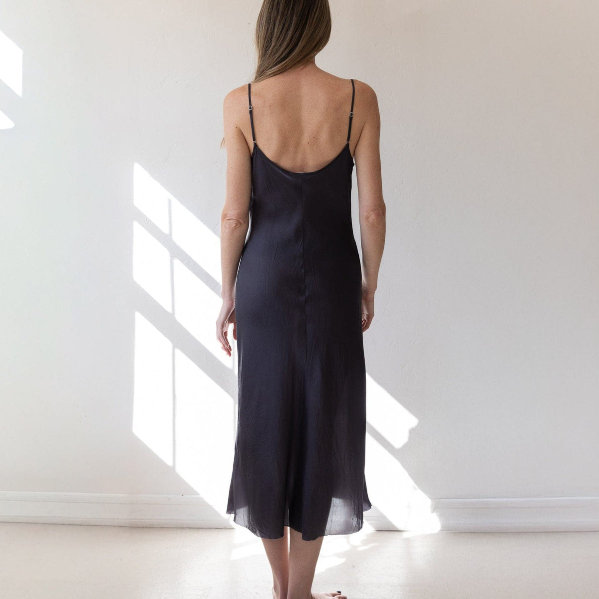 long black slip for under dress Calf Length by Organic John Patrick wearing a slip under a dress