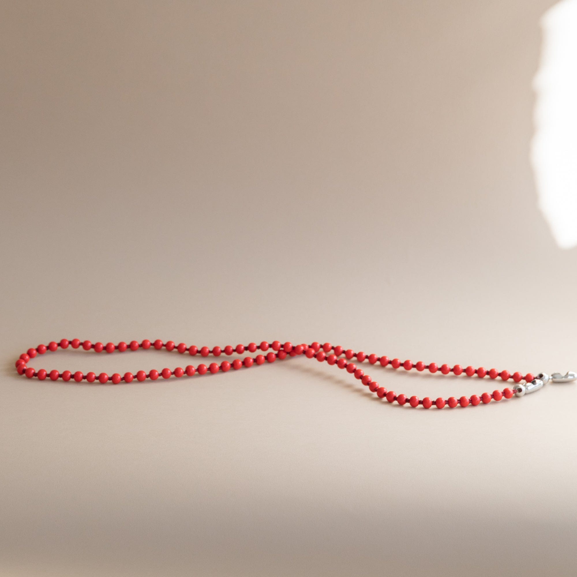 Ossa New York Tech Accessories Crossbody Phone Cord in Red Wooden Beads