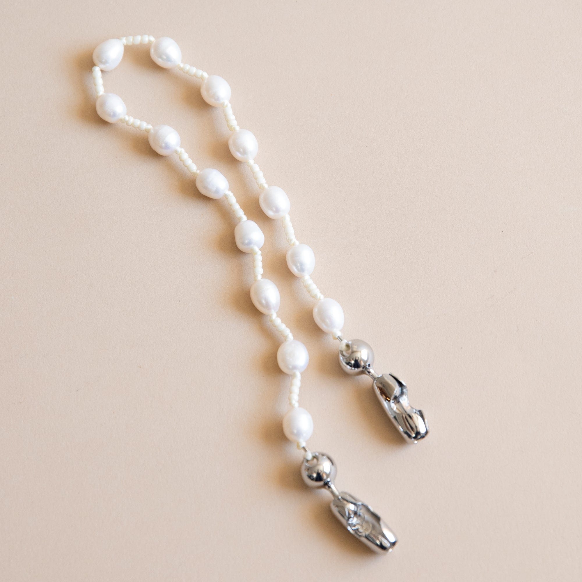 Ossa New York Tech Accessories White Beads Wristlet Phone Cord in Pearl by Ossa