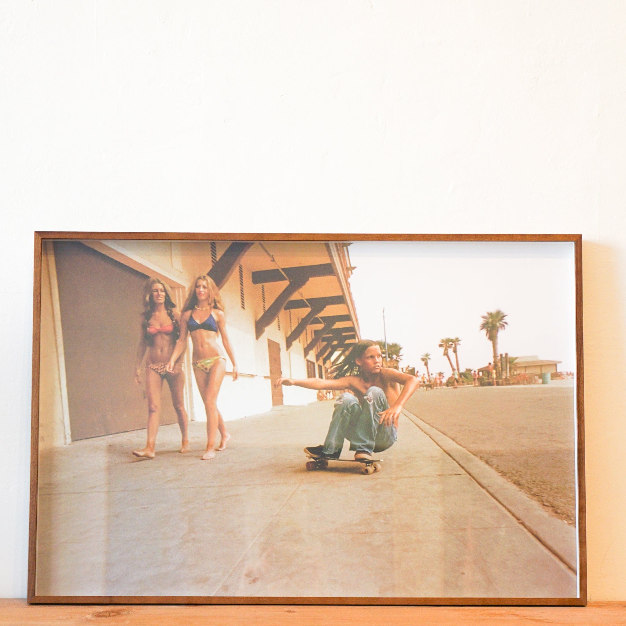 Pierre Long Wall Art Framed Poster  "Sidewalk Surfer," Huntington Beach, 1976 by Hugh Holland