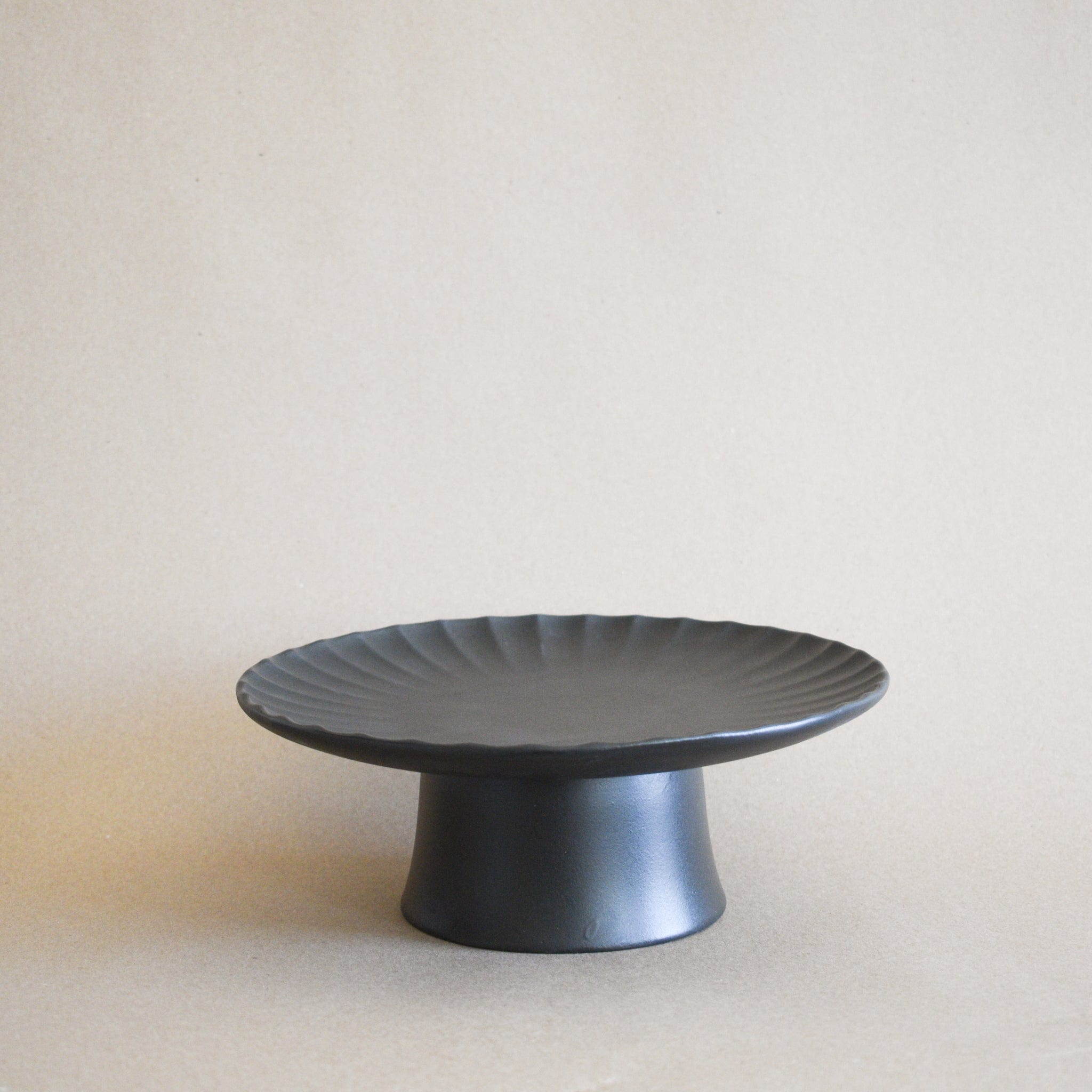 Serax Serveware Inku Scalloped Edge Ceramic Cake Stand in Black