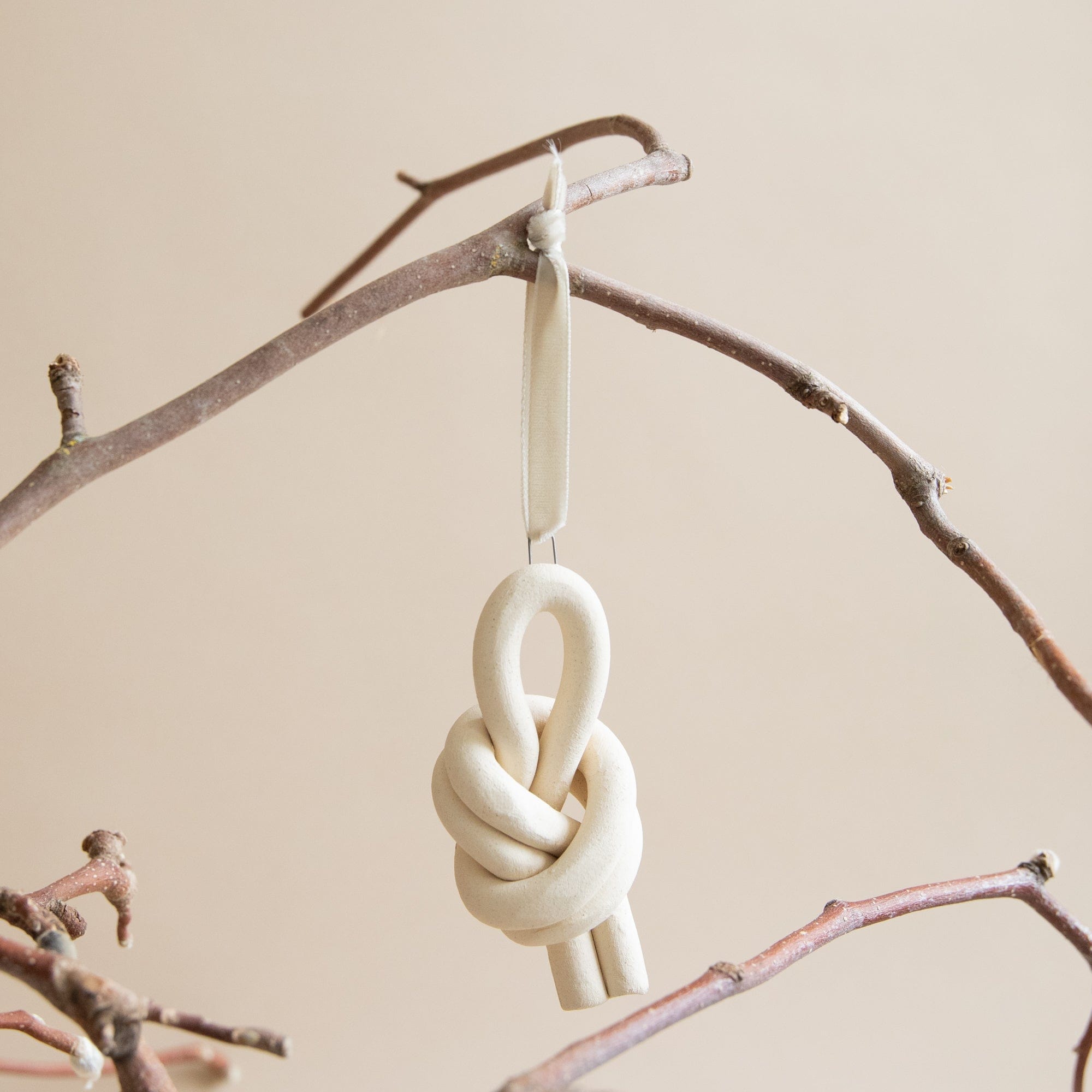 SIN Seasonal Ceramic Knot Ornament by Virginia Sin