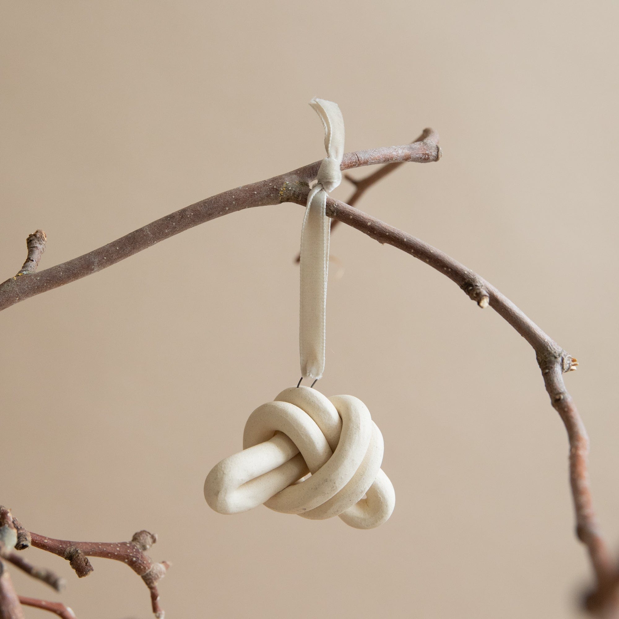 SIN Seasonal Ceramic Knot Ornament by Virginia Sin