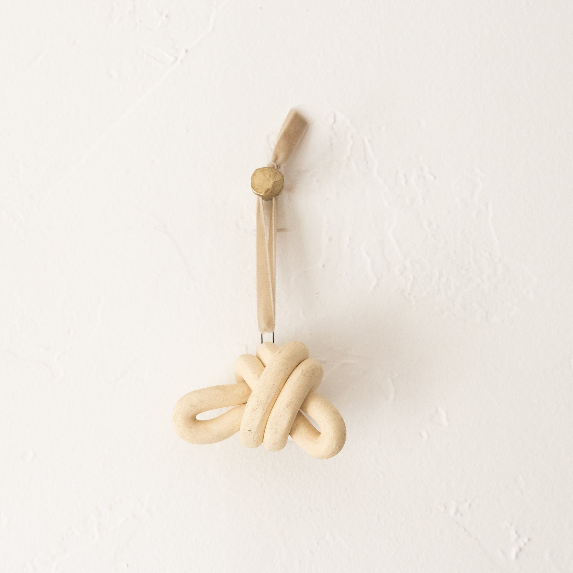 SIN Seasonal Marin Double Loop Knot Ceramic Knot Ornament by Virginia Sin