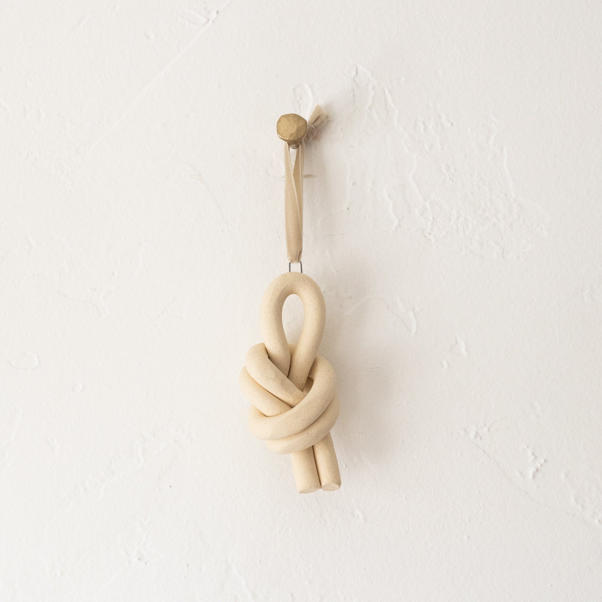 SIN Seasonal Marin Overhand Knot Ceramic Knot Ornament by Virginia Sin